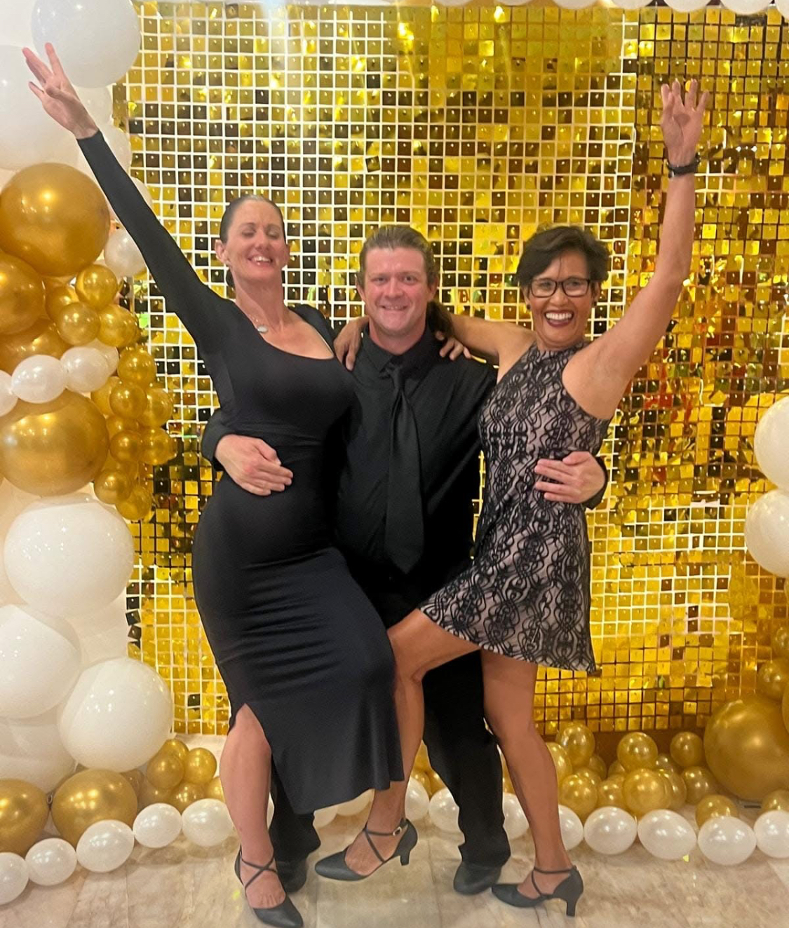 dance4Life FNQ celebration event with gold backdrop