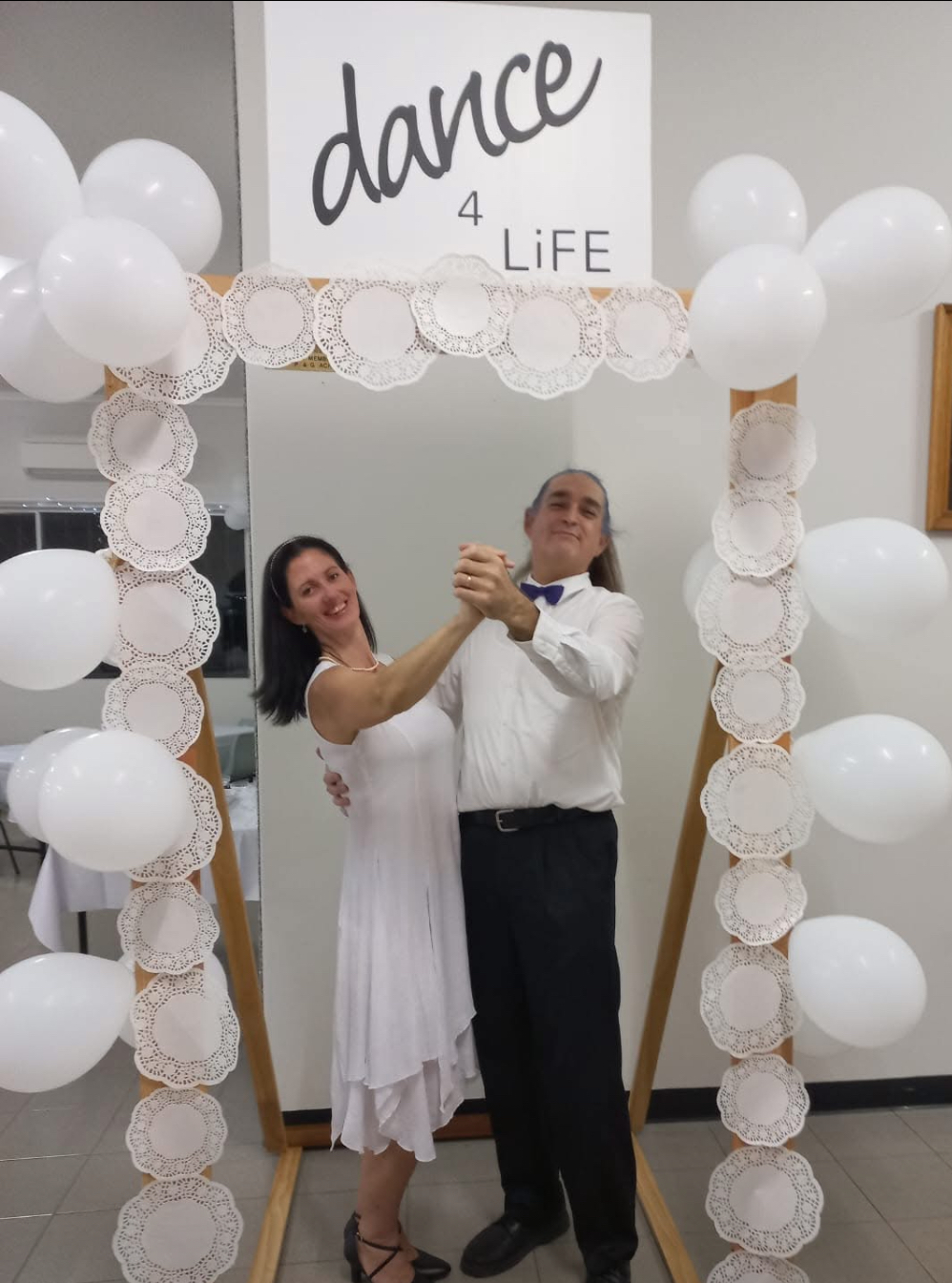 Elegant formal dance couple at dance4Life FNQ event